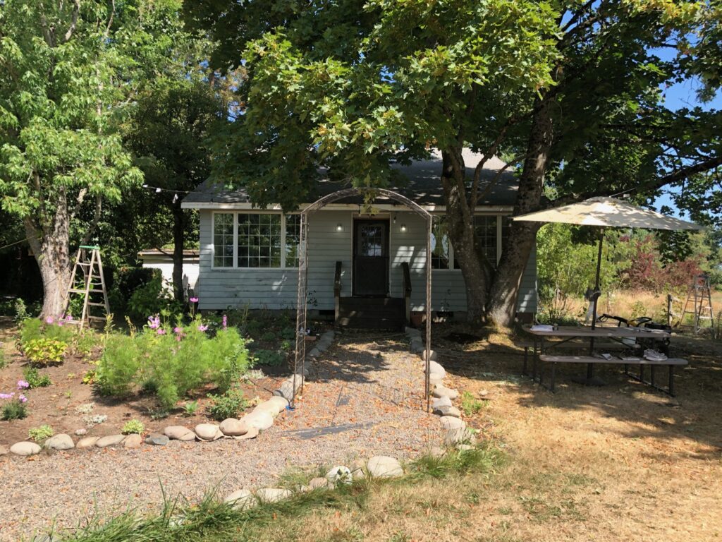 Photo of Swedish Cottage before red paint and landscape added.