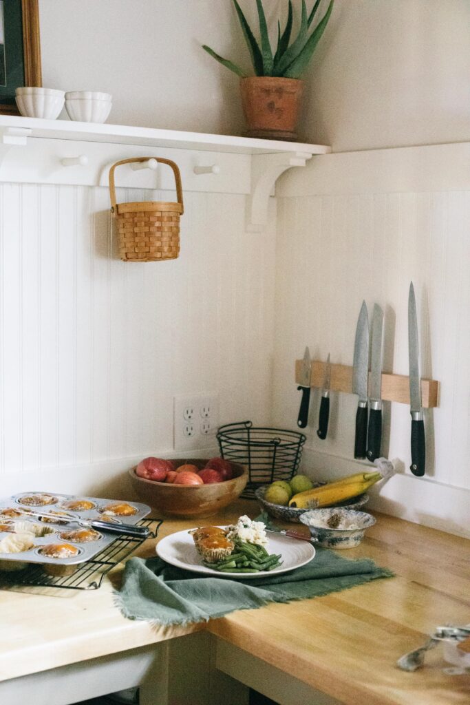 Image of meatloaf muffins on a counter in a farm cottage kitchen