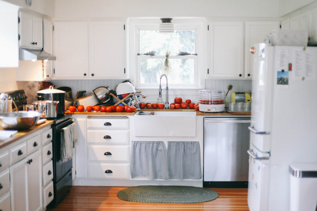 Image of a small white farmhouse kitchen