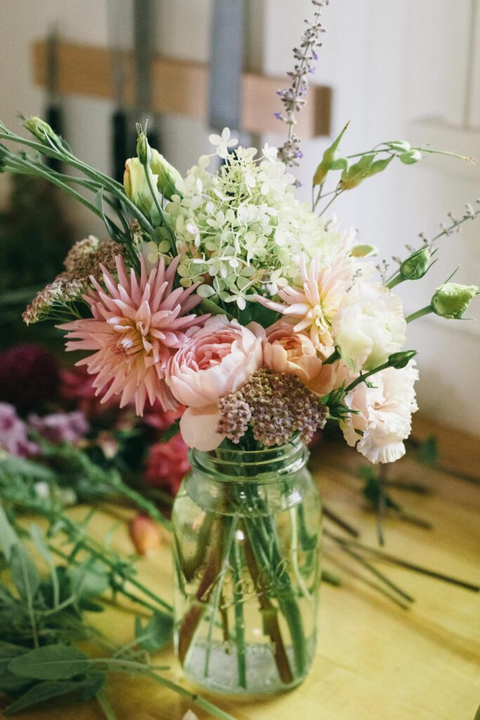 Image of a bouquet made of garden flowers in a mason jar