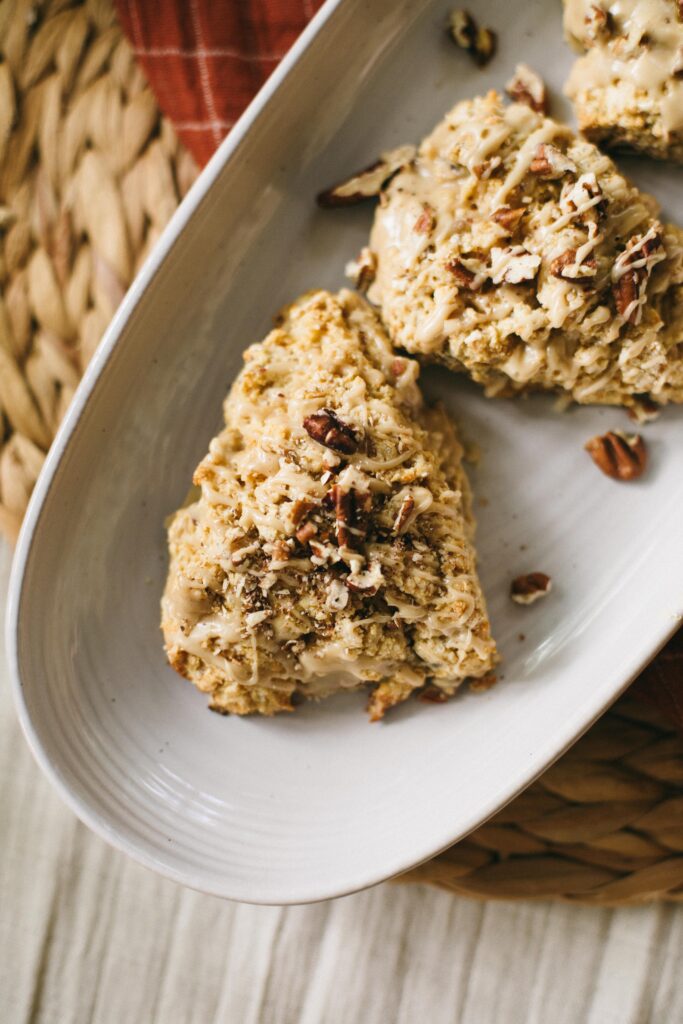 Close up image of einkorn maple pecan scones on a platter