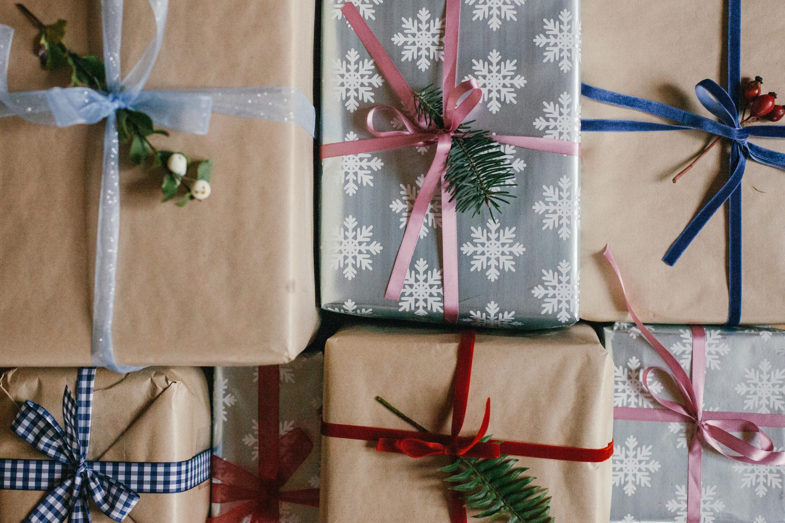 Image of wrapped christmas holiday gifts with budget friendly decorations