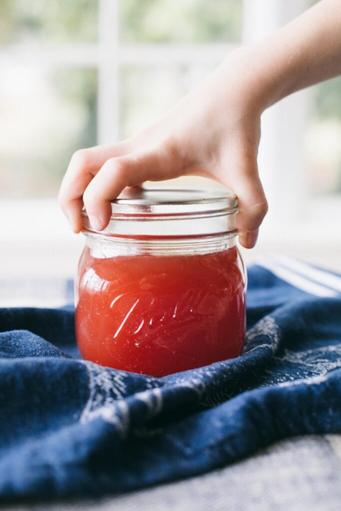 Image of a jar of quince jelly garden preserves