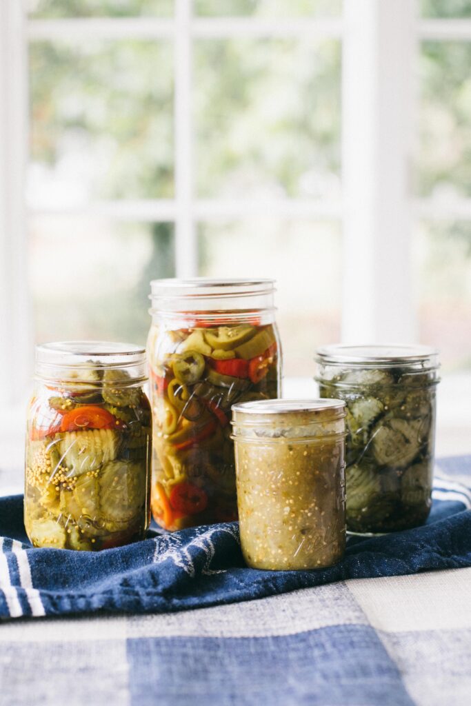 Image of a jar of home canned preserves, pickled peppers