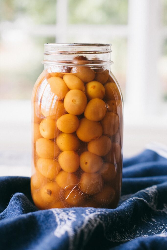 Image of a mason jar of canned cherries garden preserves